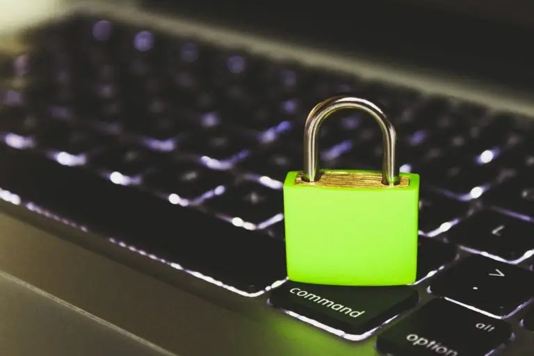 Photo of a green lock on a keyboard