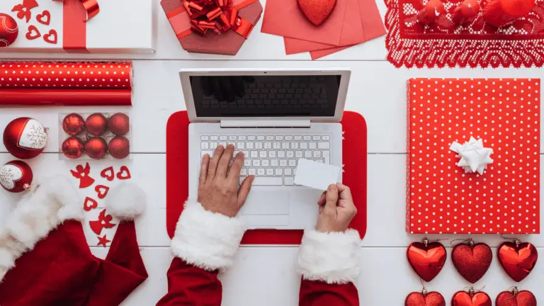 Picture of Santa working on a laptop